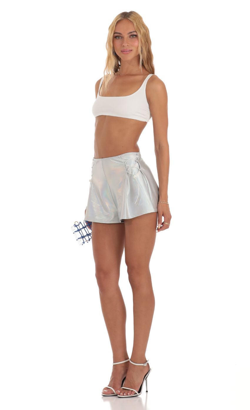 Picture Maimie Iridescent Shorts in Silver. Source: https://media.lucyinthesky.com/data/Jul23/850xAUTO/c8ed527f-be63-459e-8223-7eb8f0cc1837.jpg