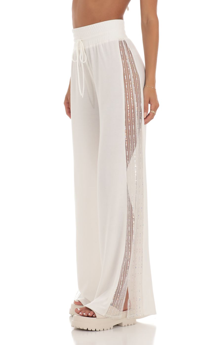 Picture Landry Sequin One Shoulder Two Piece Set in White. Source: https://media.lucyinthesky.com/data/Jul23/850xAUTO/f811c7c8-ec7d-4043-bb6e-46aea9914245.jpg