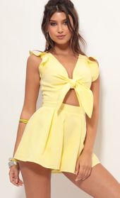 Picture thumb Blair Front Tie Romper in Yellow Gingham. Source: https://media.lucyinthesky.com/data/Jun19_1/170xAUTO/781A3163S.JPG