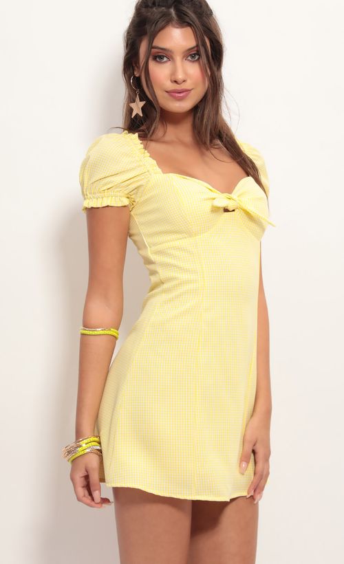 Picture Justina Puff Sleeve Dress in Yellow Gingham. Source: https://media.lucyinthesky.com/data/Jun19_1/500xAUTO/781A4518.JPG