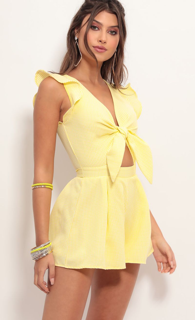 Picture Blair Front Tie Romper in Yellow Gingham. Source: https://media.lucyinthesky.com/data/Jun19_1/800xAUTO/781A3129.JPG