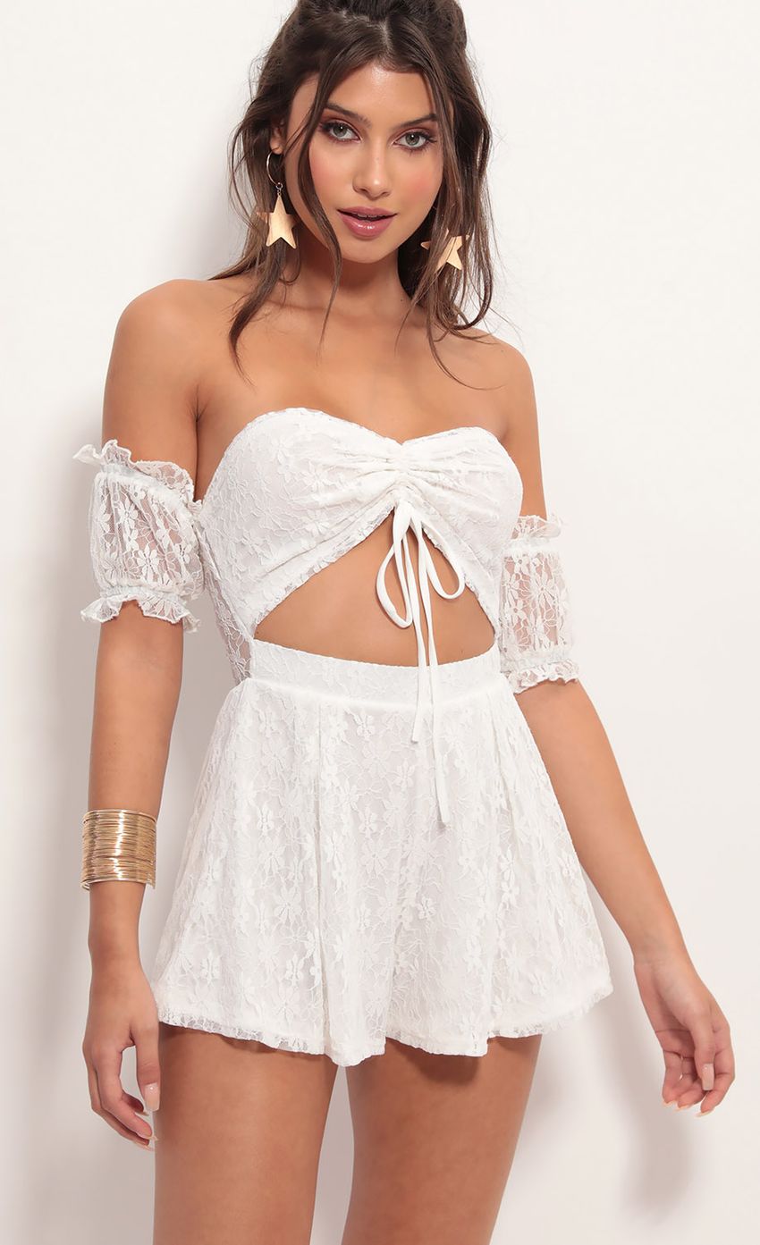Picture Hailee Dainty Lace Romper in White. Source: https://media.lucyinthesky.com/data/Jun19_1/850xAUTO/781A4556.JPG