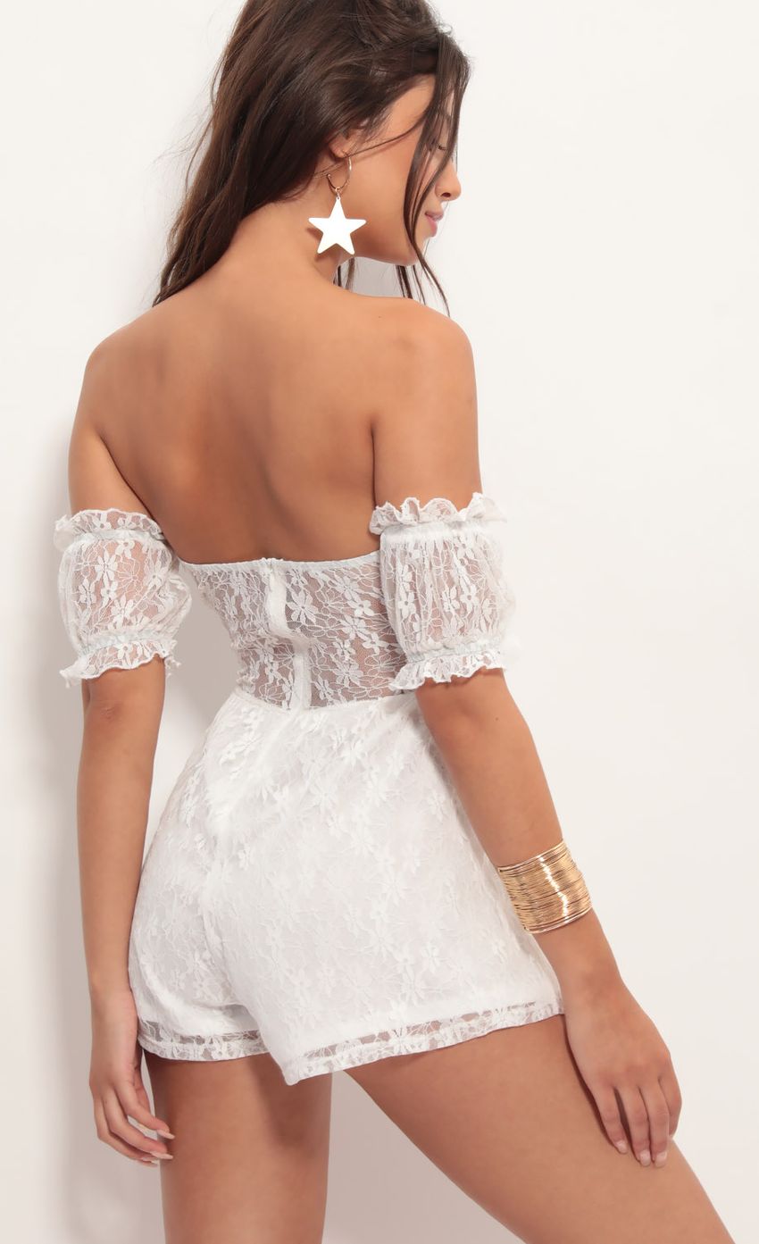 Picture Hailee Dainty Lace Romper in White. Source: https://media.lucyinthesky.com/data/Jun19_1/850xAUTO/781A4575.JPG