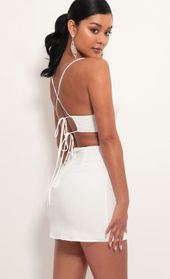 Picture thumb Lana Cutout Dress in White Pinstripes. Source: https://media.lucyinthesky.com/data/Jun19_2/170xAUTO/781A5932.JPG