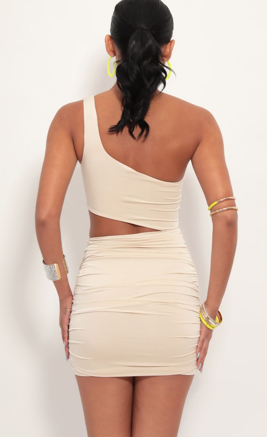 Picture Champagne Showers One shoulder Ruched Cutout Dress in Champagne. Source: https://media.lucyinthesky.com/data/Jun19_2/850xAUTO/781A6485.JPG