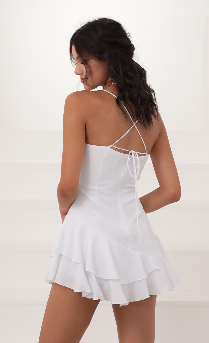 Picture Azura Asymmetrical Frill Dress in White. Source: https://media.lucyinthesky.com/data/Jun20_1/850xAUTO/781A3014.JPG