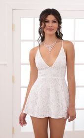 Picture thumb Vivia A-line Plunge Lace Dress In White. Source: https://media.lucyinthesky.com/data/Jun20_2/170xAUTO/781A0576.JPG