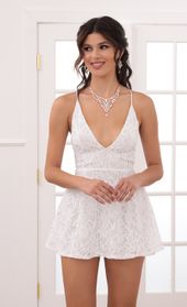 Picture thumb Vivia A-line Plunge Lace Dress In White. Source: https://media.lucyinthesky.com/data/Jun20_2/170xAUTO/781A0588.JPG