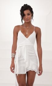 Picture thumb Becca Wrap Ruffle Dress in White. Source: https://media.lucyinthesky.com/data/Jun20_2/170xAUTO/781A2727.JPG