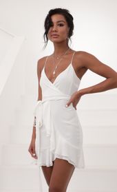 Picture thumb Becca Wrap Ruffle Dress in White. Source: https://media.lucyinthesky.com/data/Jun20_2/170xAUTO/781A2760.JPG