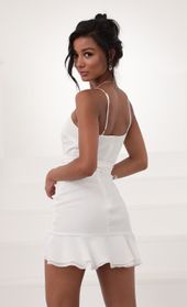 Picture thumb Becca Wrap Ruffle Dress in White. Source: https://media.lucyinthesky.com/data/Jun20_2/170xAUTO/781A2830.JPG