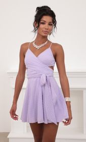 Picture thumb Jillian Chiffon Wrap Dress in Lavender Dots. Source: https://media.lucyinthesky.com/data/Jun20_2/170xAUTO/781A6785.JPG