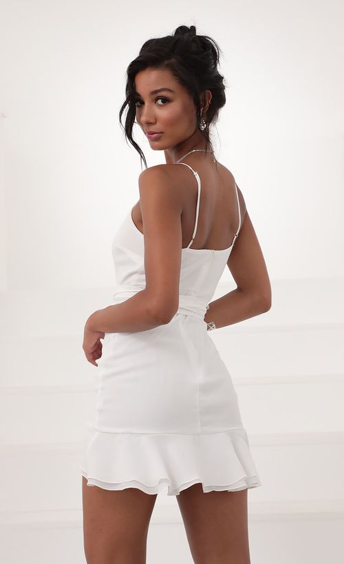 Picture Becca Wrap Ruffle Dress in White. Source: https://media.lucyinthesky.com/data/Jun20_2/500xAUTO/781A2830.JPG