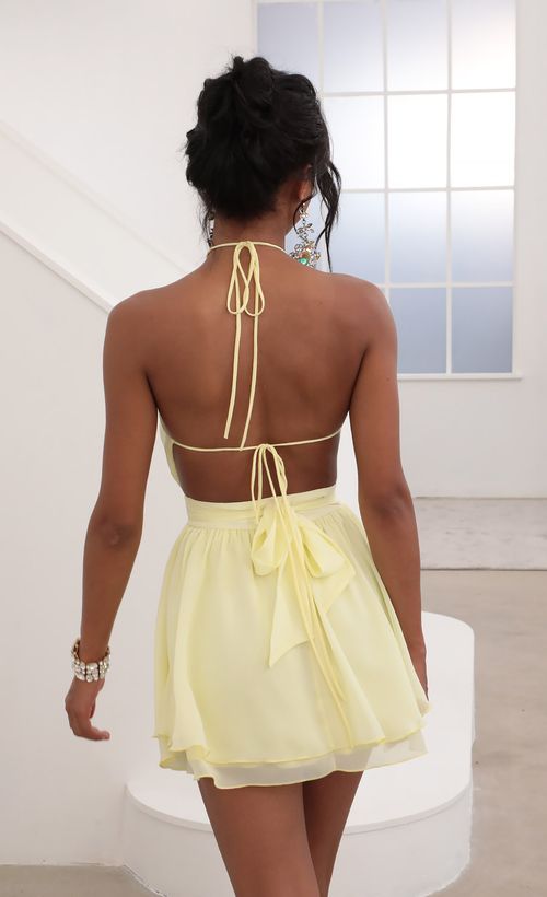 Picture Brielle Halter Chiffon Dress in Yellow. Source: https://media.lucyinthesky.com/data/Jun20_2/500xAUTO/781A3197.JPG