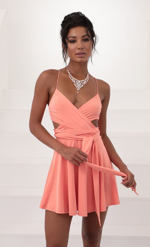 Picture Aliah Wrap Dress in Coral. Source: https://media.lucyinthesky.com/data/Jun20_2/500xAUTO/781A5527.JPG