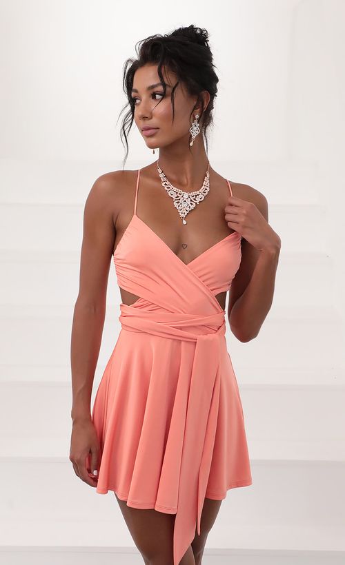 Picture Aliah Wrap Dress in Coral. Source: https://media.lucyinthesky.com/data/Jun20_2/500xAUTO/781A5554.JPG