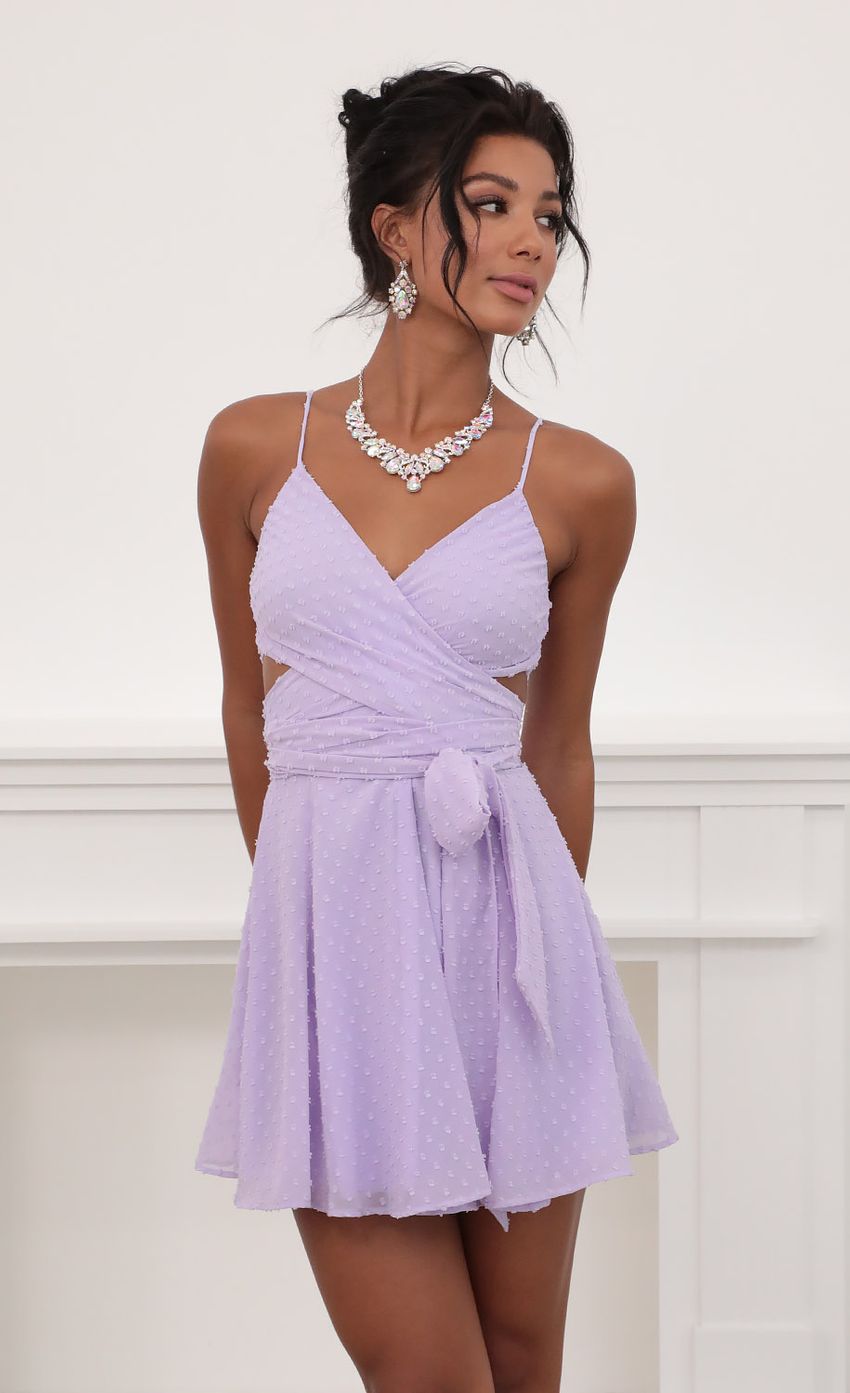 Picture Jillian Chiffon Wrap Dress in Lavender Dots. Source: https://media.lucyinthesky.com/data/Jun20_2/850xAUTO/781A6827.JPG
