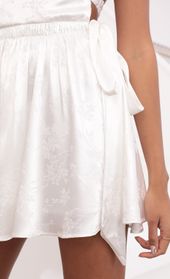 Picture thumb Berenice Halter Dress in White Floral Jacquard. Source: https://media.lucyinthesky.com/data/Jun21_1/170xAUTO/1V9A0130.JPG