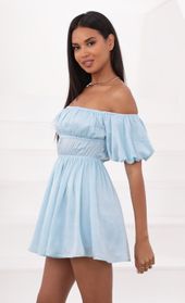 Picture thumb Dorothy Off The Shoulder Dress in Light Blue. Source: https://media.lucyinthesky.com/data/Jun21_1/170xAUTO/1V9A1679.JPG
