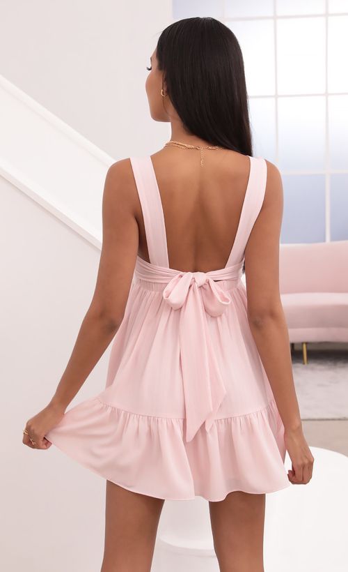 Picture Aurora Square Neckline Dress in Pink Pinstripes. Source: https://media.lucyinthesky.com/data/Jun21_1/500xAUTO/1V9A4189.JPG