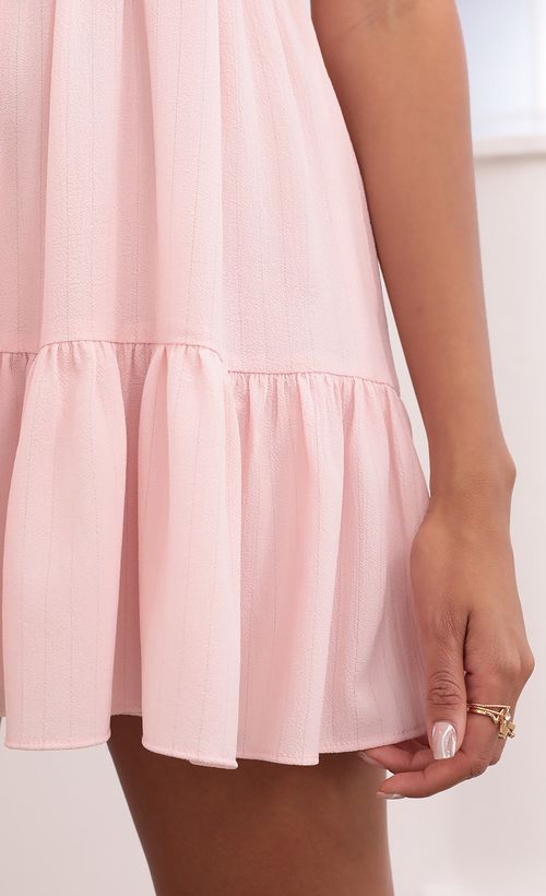 Picture Aurora Square Neckline Dress in Pink Pinstripes. Source: https://media.lucyinthesky.com/data/Jun21_1/500xAUTO/1V9A4239.JPG