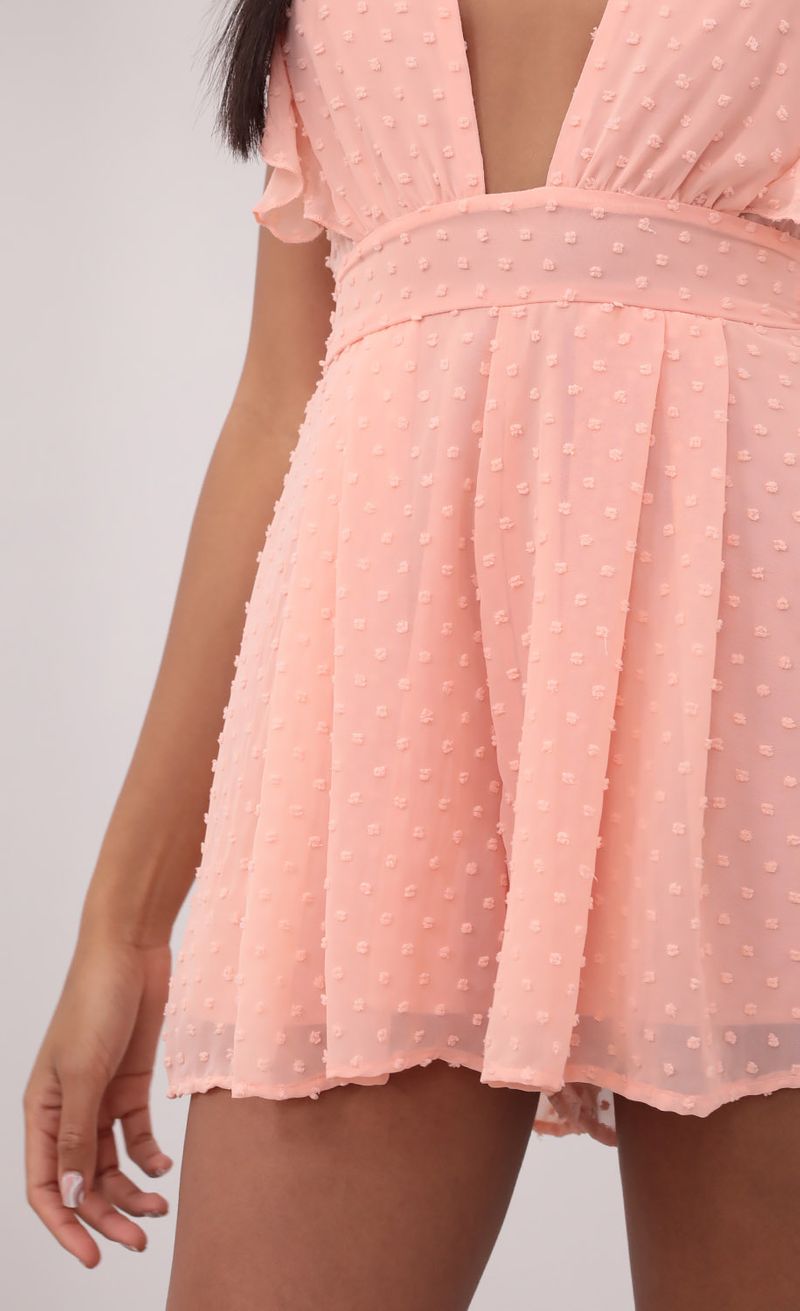 Picture Layla Ruffle Pastel Coral Romper in Dotted Chiffon. Source: https://media.lucyinthesky.com/data/Jun21_1/800xAUTO/1V9A2769.JPG