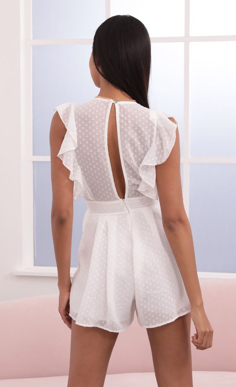 Picture Layla Ruffle White Romper in Dotted Chiffon. Source: https://media.lucyinthesky.com/data/Jun21_1/800xAUTO/1V9A4002.JPG