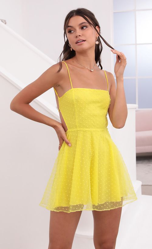 Picture Alaia Floral  A-Line Dress in Yellow. Source: https://media.lucyinthesky.com/data/Jun21_2/500xAUTO/1V9A1936.JPG