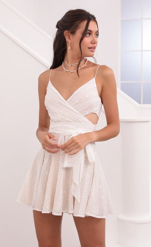 Picture Jillian Chiffon Wrap Dress in White. Source: https://media.lucyinthesky.com/data/Jun21_2/500xAUTO/1V9A3072.JPG