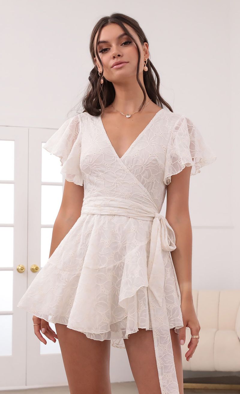 Picture Eliza Wrap Dress in Cream. Source: https://media.lucyinthesky.com/data/Jun21_2/800xAUTO/1V9A1707.JPG