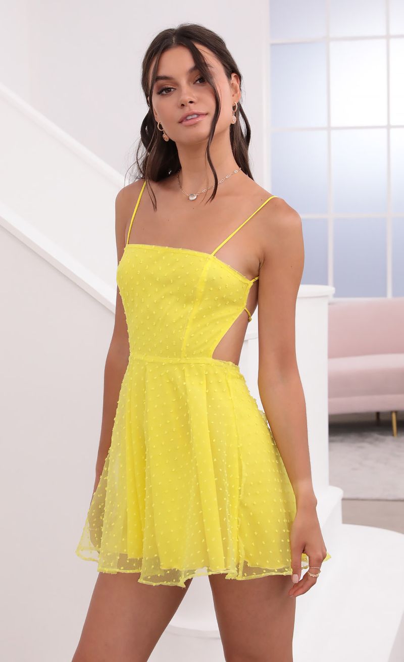 Picture Alaia Floral  A-Line Dress in Yellow. Source: https://media.lucyinthesky.com/data/Jun21_2/800xAUTO/1V9A1966.JPG
