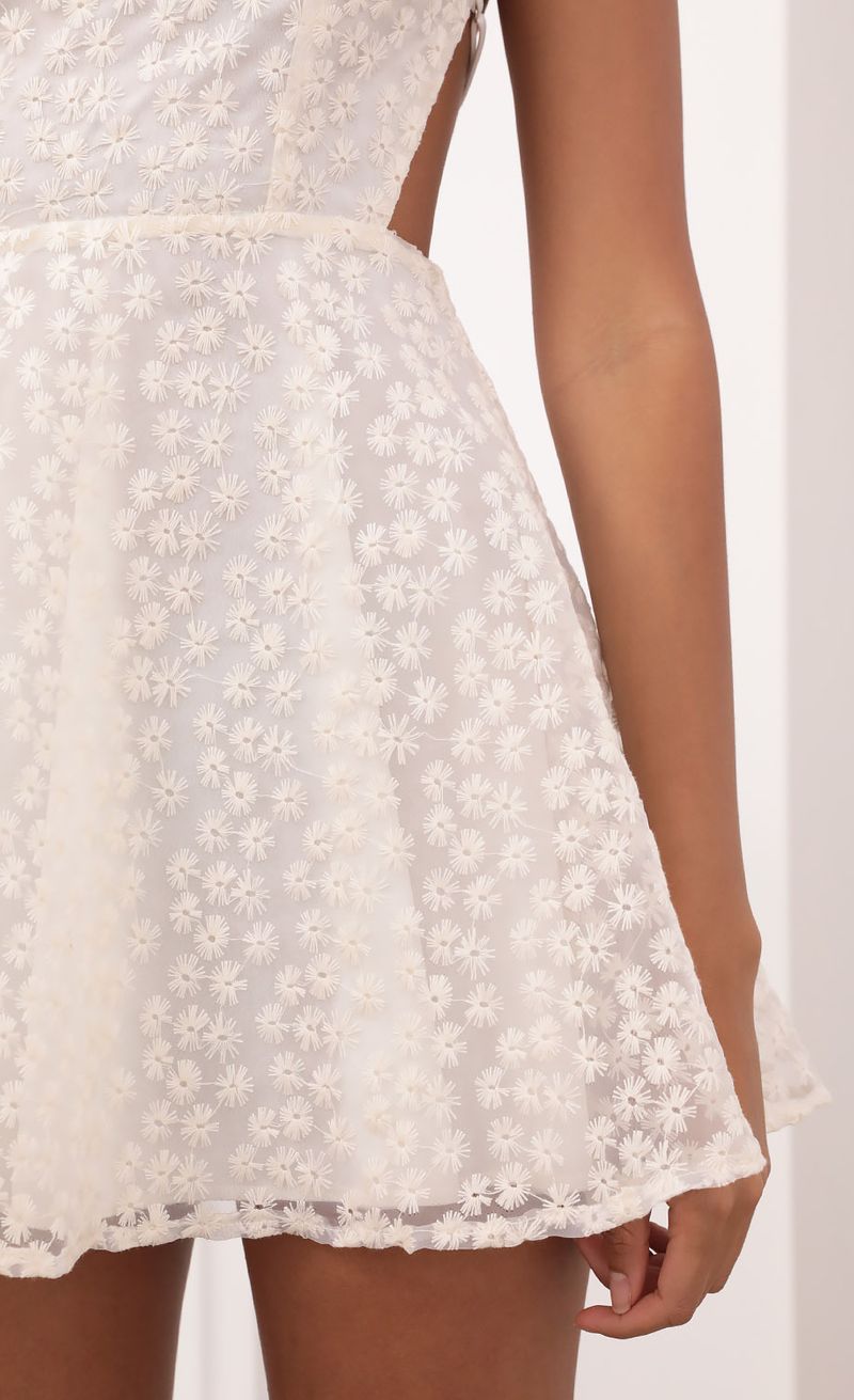 Picture Alaia Floral  A-Line Dress in White. Source: https://media.lucyinthesky.com/data/Jun21_2/800xAUTO/1V9A4025.JPG