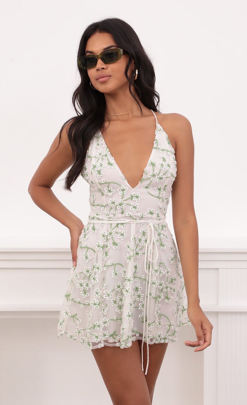 Picture Vivia Embroidered Floral Dress in White. Source: https://media.lucyinthesky.com/data/Jun21_2/850xAUTO/1V9A2838.JPG