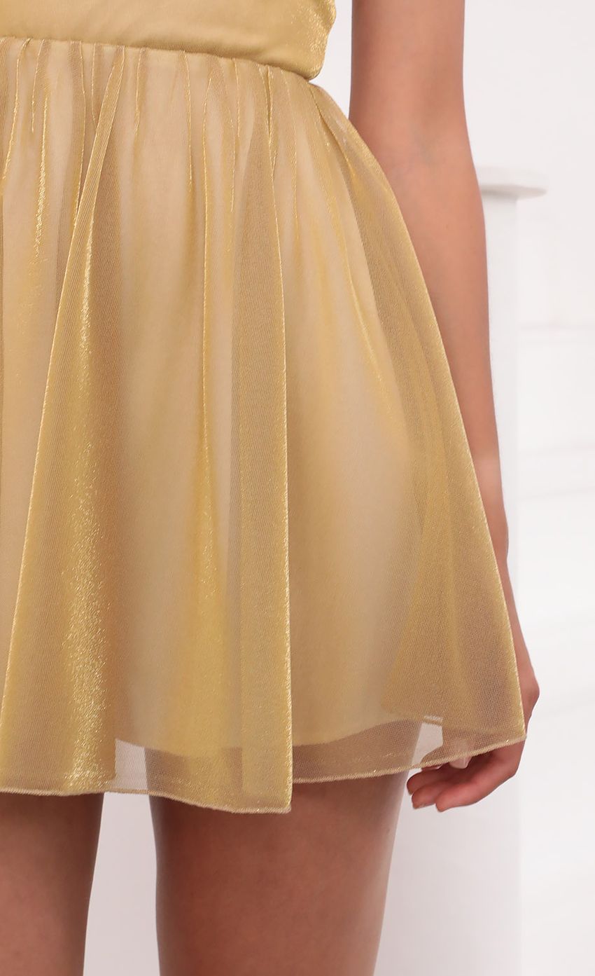 Picture Jacqueline Pleated Mesh Dress in Gold. Source: https://media.lucyinthesky.com/data/Jun21_2/850xAUTO/1V9A4159.JPG