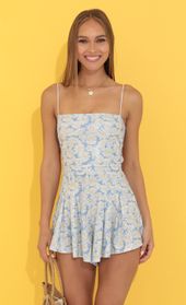 Picture thumb Bella Floral Pleated Romper in Blue. Source: https://media.lucyinthesky.com/data/Jun22_1/170xAUTO/1V9A0714.JPG