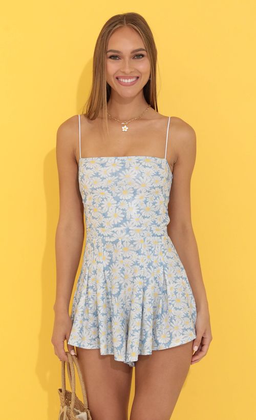 Picture Bella Floral Pleated Romper in Blue. Source: https://media.lucyinthesky.com/data/Jun22_1/500xAUTO/1V9A0714.JPG