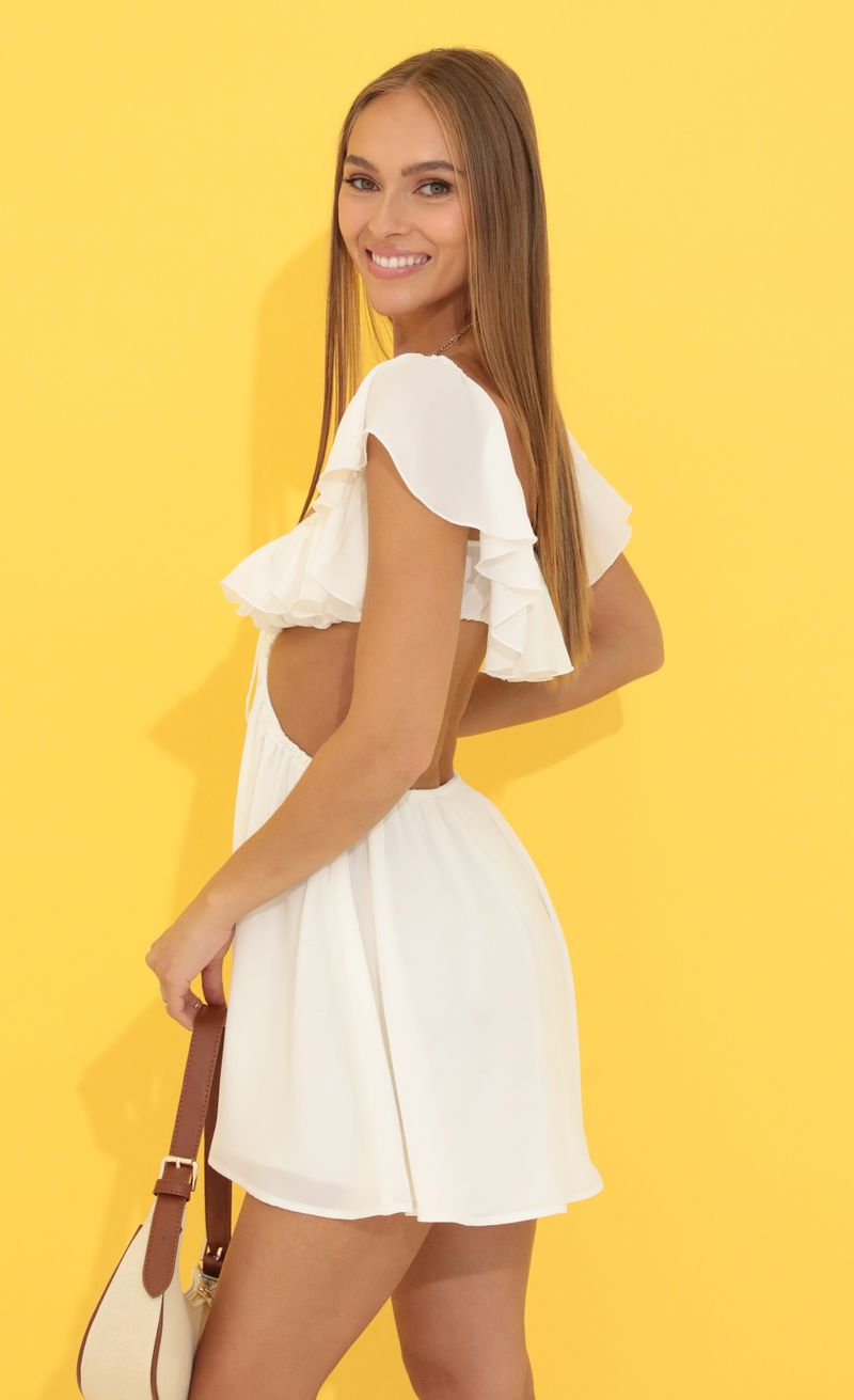 Picture Gisele Cutout Ruffle Dress in White. Source: https://media.lucyinthesky.com/data/Jun22_1/800xAUTO/1V9A8284.JPG