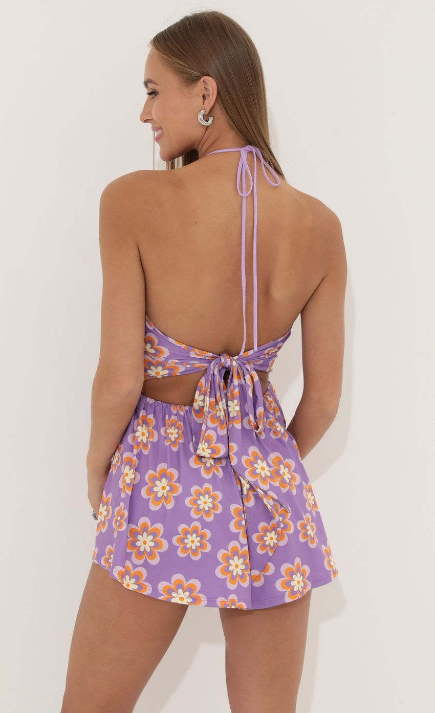 Picture Sierra Floral Cutout Romper in Purple. Source: https://media.lucyinthesky.com/data/Jun22_1/850xAUTO/1V9A4460.JPG