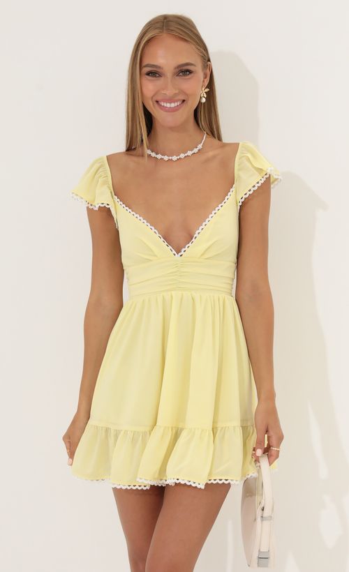 Picture Gaby Fit and Flare Chiffon Dress in Yellow. Source: https://media.lucyinthesky.com/data/Jun22_2/500xAUTO/1V9A4595.JPG