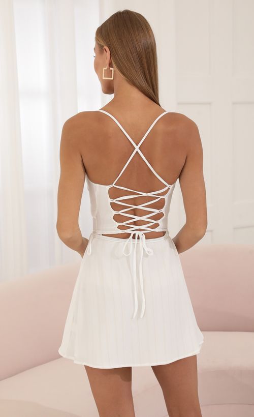 Picture Peregrine Crepe Pinstripe Cutout Dress in White. Source: https://media.lucyinthesky.com/data/Jun22_2/500xAUTO/1V9A7994.JPG