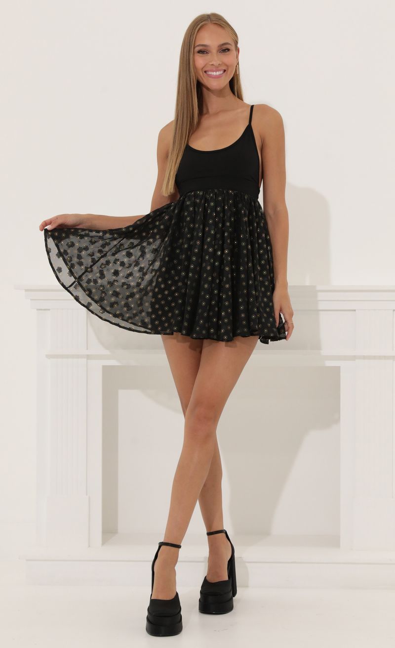 Picture Ginger Floral Baby Doll Dress in Black. Source: https://media.lucyinthesky.com/data/Jun22_2/800xAUTO/1V9A7062.JPG