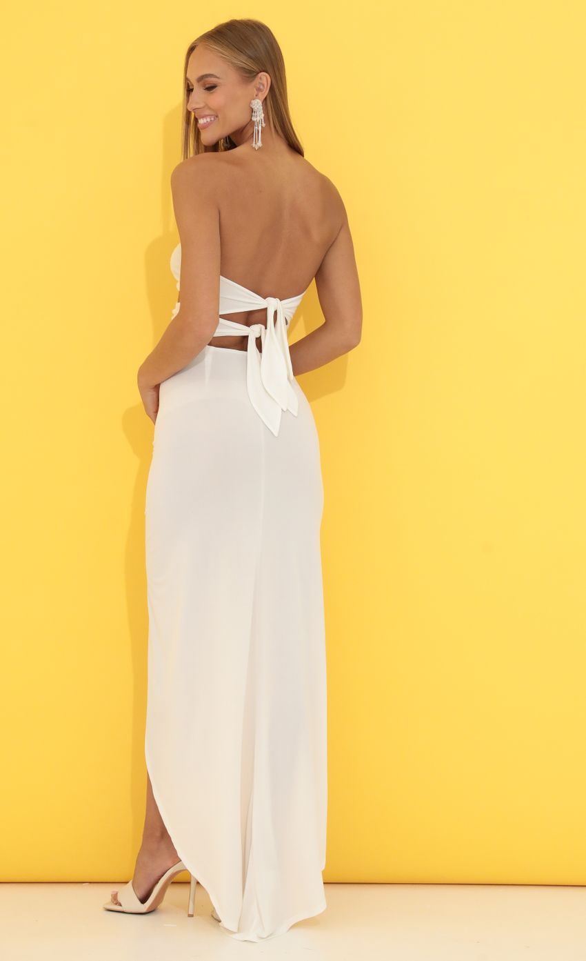 Picture Devon Sequin Cutout Maxi Dress in White. Source: https://media.lucyinthesky.com/data/Jun22_2/850xAUTO/1V9A5086.JPG