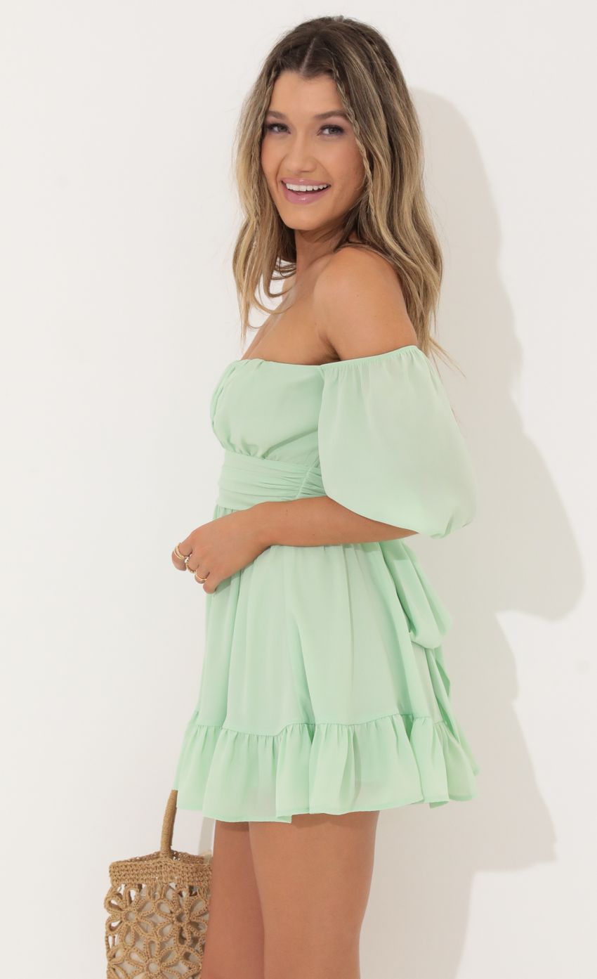 Picture Roxana Off The Shoulder Dress in Green. Source: https://media.lucyinthesky.com/data/Jun22_2/850xAUTO/1V9A8214.JPG