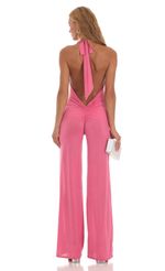 Picture Cath Foiled Open Back Jumpsuit in Pink. Source: https://media.lucyinthesky.com/data/Jun23/150xAUTO/87c3f52b-4b5e-461c-8179-ce6648db8a32.jpg