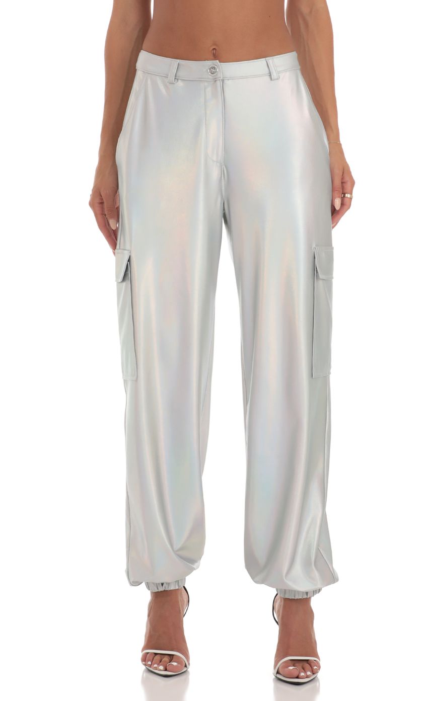Picture Spacey Holographic Pants in Silver. Source: https://media.lucyinthesky.com/data/Jun23/850xAUTO/2bb90df8-8191-4066-a60b-d66d08c4f296.jpg