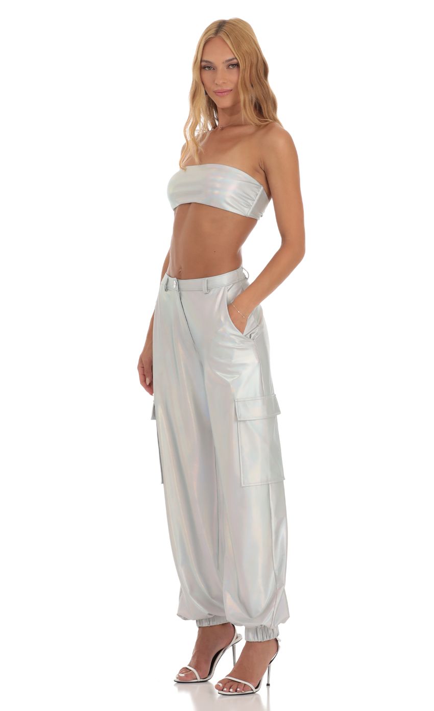 Picture Spacey Holographic Pants in Silver. Source: https://media.lucyinthesky.com/data/Jun23/850xAUTO/6bc9a590-4643-42d1-afc8-a85802c5af93.jpg