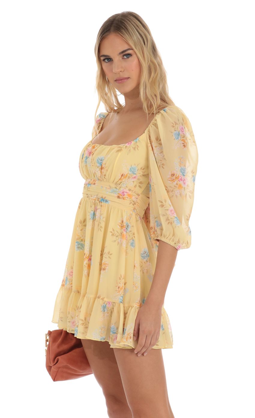Picture Neia Floral Ruffle Dress in Yellow. Source: https://media.lucyinthesky.com/data/Jun23/850xAUTO/ddf6e111-6dfb-4ce6-a740-8d7c3b502672.jpg