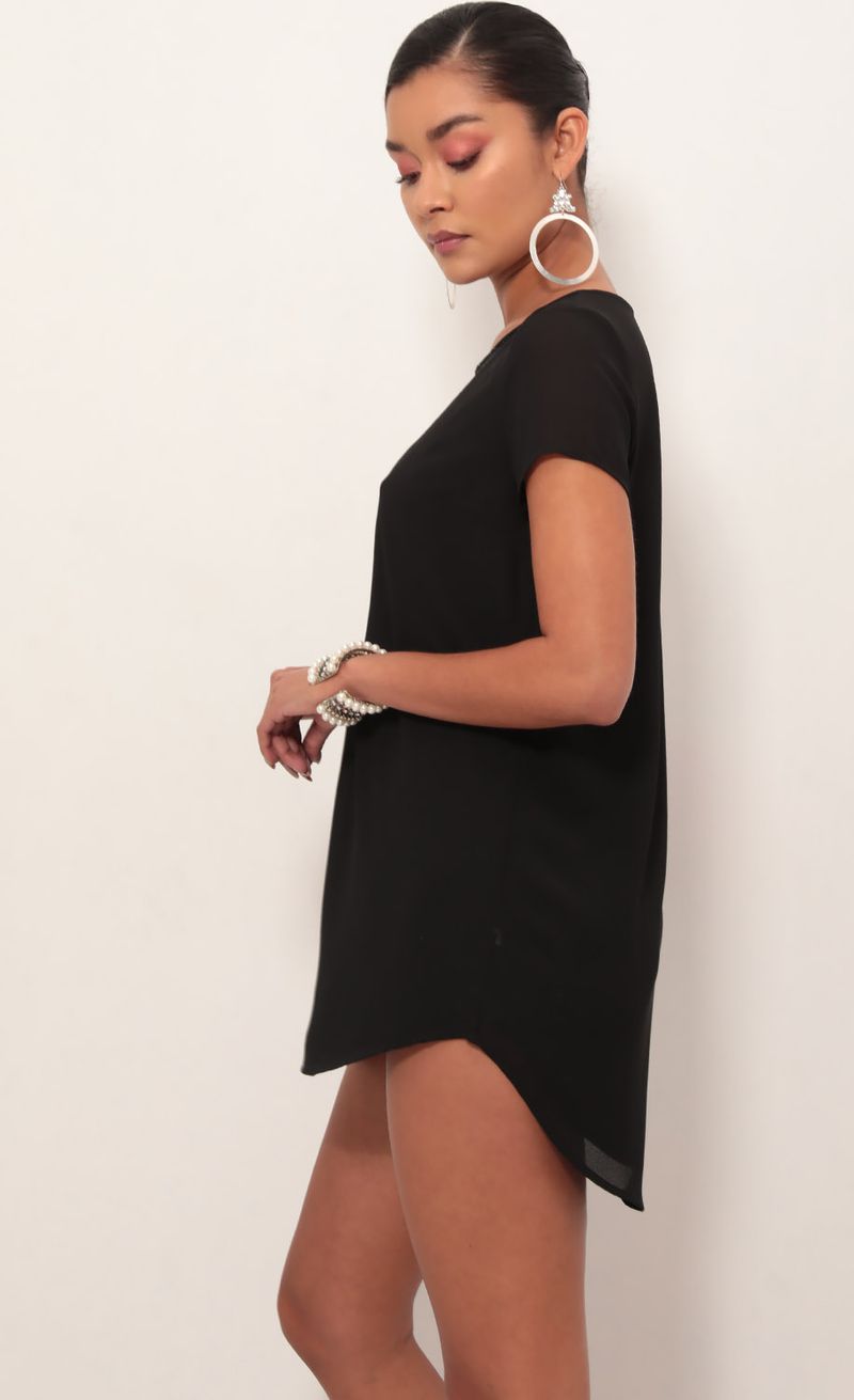 Picture Chanel Plunge Shift Dress in Black Shimmer. Source: https://media.lucyinthesky.com/data/Mar19_1/800xAUTO/781A2511.JPG