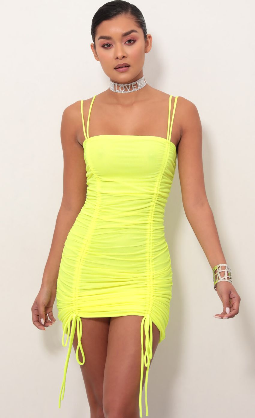 Picture Double Trouble Ruched Dress in Neon Yellow. Source: https://media.lucyinthesky.com/data/Mar19_1/850xAUTO/781A4993.JPG