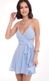 Picture thumb Jillian Chiffon Wrap Dress in Blue Dots. Source: https://media.lucyinthesky.com/data/Mar20_1/170xAUTO/781A6085.JPG